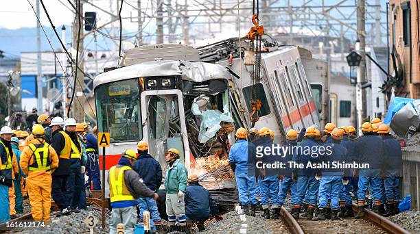 The carriage of the derailed Sanyo Electric Railway Co. Train is to be lifted to remove from the accident site a day after a collision with a truck...