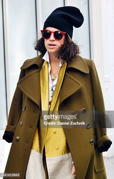 Leandra Medine seen outside the Rodarte show wearing a Dries Van Noten jacket and a Elie Tahari suit on February 12, 2013 in New York City.