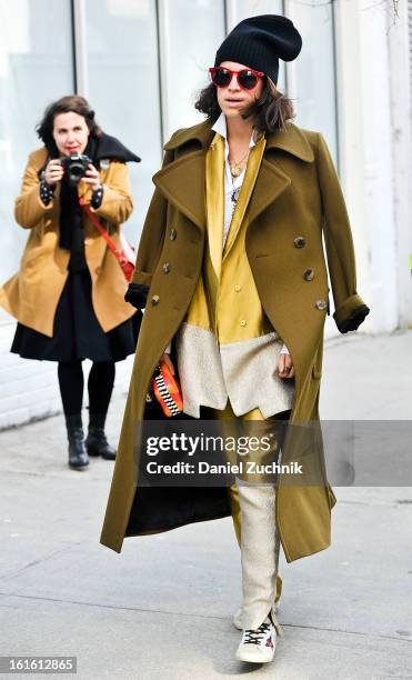 Leandra Medine seen outside the Rodarte show wearing a Dries Van Noten jacket and a Elie Tahari suit on February 12, 2013 in New York City.