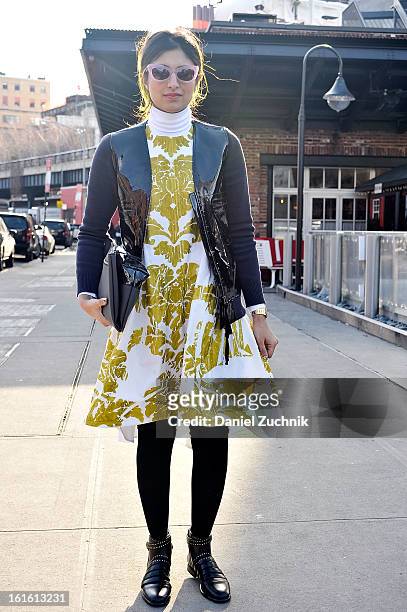 Preetma Singh, market editor for Wall Street Journal, seen outside the Nonoo show wearing a Joe Fresh dress on February 12, 2013 in New York City.