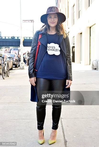 Jena Gambaccini, editor at ChiCityFashion from Chicago, seen outside the Perry Ellis by Duckie Brown show wearing a Markus Lupfer sweater, Barneys...