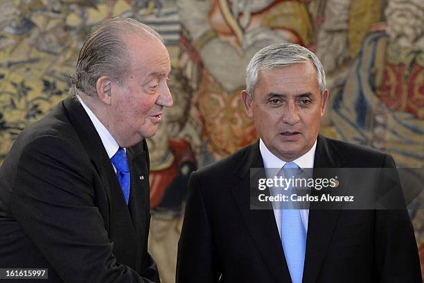 King Juan Carlos of Spain receives Guatemalan President Otto Perez Molina at Zarzuela Palace on February 13, 2013 in Madrid, Spain.