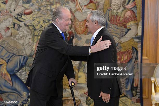 King Juan Carlos of Spain receives Guatemalan President Otto Perez Molina at Zarzuela Palace on February 13, 2013 in Madrid, Spain.