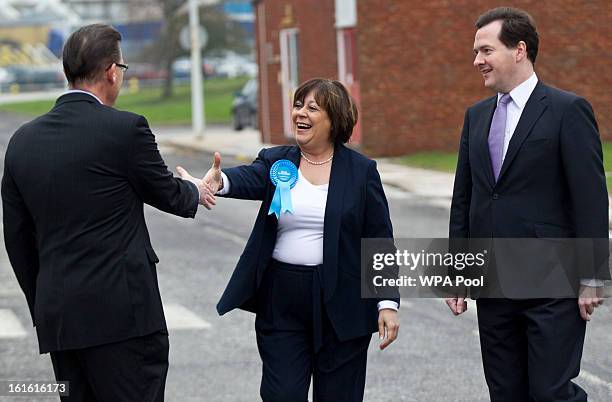 Chancellor George Osborne and Conservative candidate Maria Hutchings are greeted by the company's UK CEO Paul Atkinson as they make a visit to the...