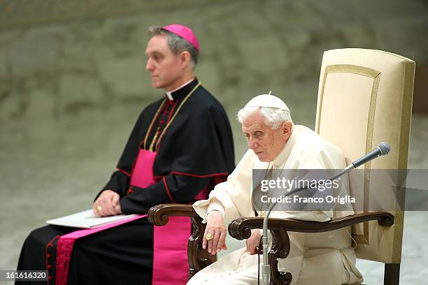 Pope Benedict XVI sits beside his personal secretary Georg Ganswein during his weekly audience on February 13, 2013 in Vatican City, Vatican. The...