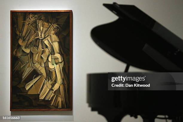 Piece of work entitled Nude Descending a Staircase by Marcel Duchamp is displayed during a press preview of 'The Bride and the Bachelors' exhibition...