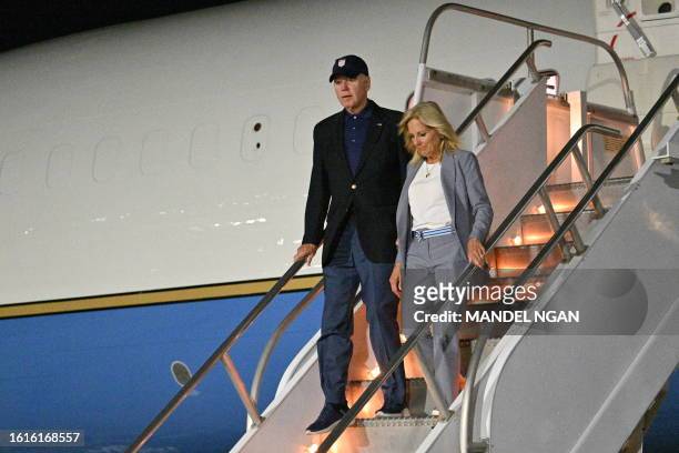 President Joe Biden and First Lady Jill Biden step off Air Force One upon arrival at Reno-Tahoe International Airport in Reno, Nevada on August 22,...