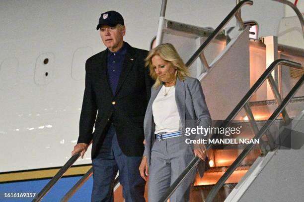 President Joe Biden and First Lady Jill Biden step off Air Force One upon arrival at Reno-Tahoe International Airport in Reno, Nevada on August 22,...