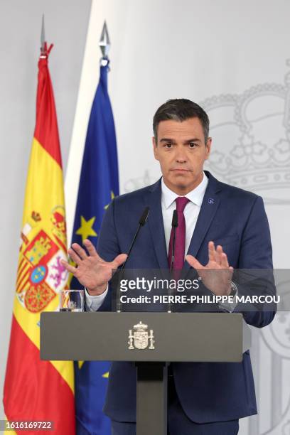 Spain's acting Prime Minister Pedro Sanchez gestures during a press conference after meeting with the King as part of the round of consultations with...