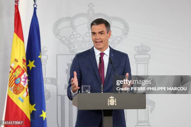 Spain's acting Prime Minister Pedro Sanchez gestures during a press conference after meeting with the King as part of the round of consultations with...