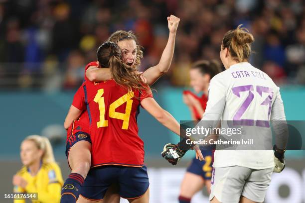 Irene Paredes, Laia Codina and Cata Coll of Spain celebrate the team’s 2-1 victory and advance to the final following during the FIFA Women's World...