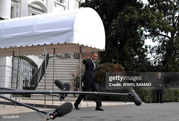 President Barack Obama leaves the White House in Washington, DC, on February 13, 2013. Obama left for Asheville, North Carolina, to speaks at a...