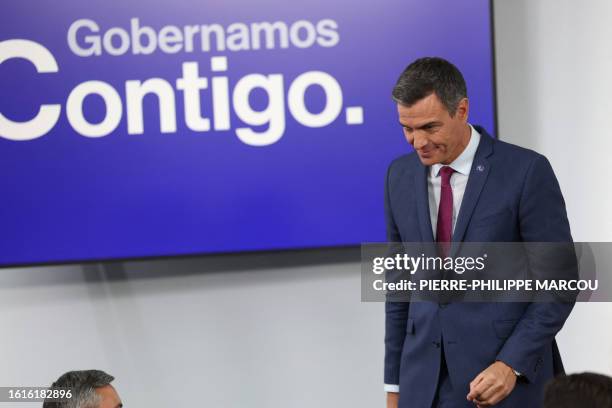 Spain's acting Prime Minister Pedro Sanchez leaves after a press conference following meeting with the King as part of the round of consultations...