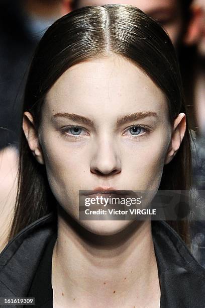 Model walks the runway at the Theyskens' Theory Ready to Wear Fall/Winter 2013-2014 fashion show during Mercedes-Benz Fashion Week at Skylight at...