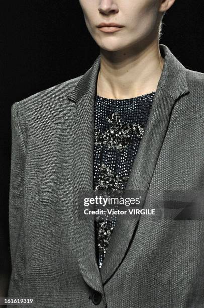 Model walks the runway at the Theyskens' Theory Ready to Wear Fall/Winter 2013-2014 fashion show during Mercedes-Benz Fashion Week at Skylight at...