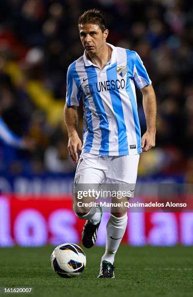 Joaquin of Malaga runs with the ball during the la Liga match between Levante UD and Malaga CF at Ciutat de Valencia on February 9, 2013 in Valencia,...