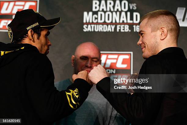 Opponents Renan Barao and Michael McDonald face off during a UFC press conference on February 13, 2013 at Hooks Gym in London, England.