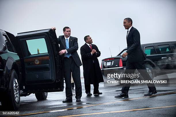 President Barack Obama arrives at Asheville Regional Airport on February 13, 2013 in Asheville, North Carolina. Obama is traveling to Asheville to...