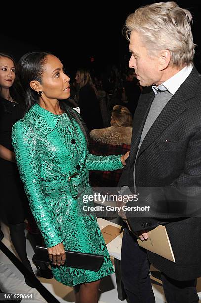 Jada Pinkett Smith and Michael Douglas attend Michael Kors during Fall 2013 Mercedes-Benz Fashion Week at The Theatre at Lincoln Center on February...