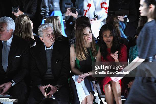 Michael Douglas, Hilary Swank and Zoe Saldana attend Michael Kors during Fall 2013 Mercedes-Benz Fashion Week at The Theatre at Lincoln Center on...