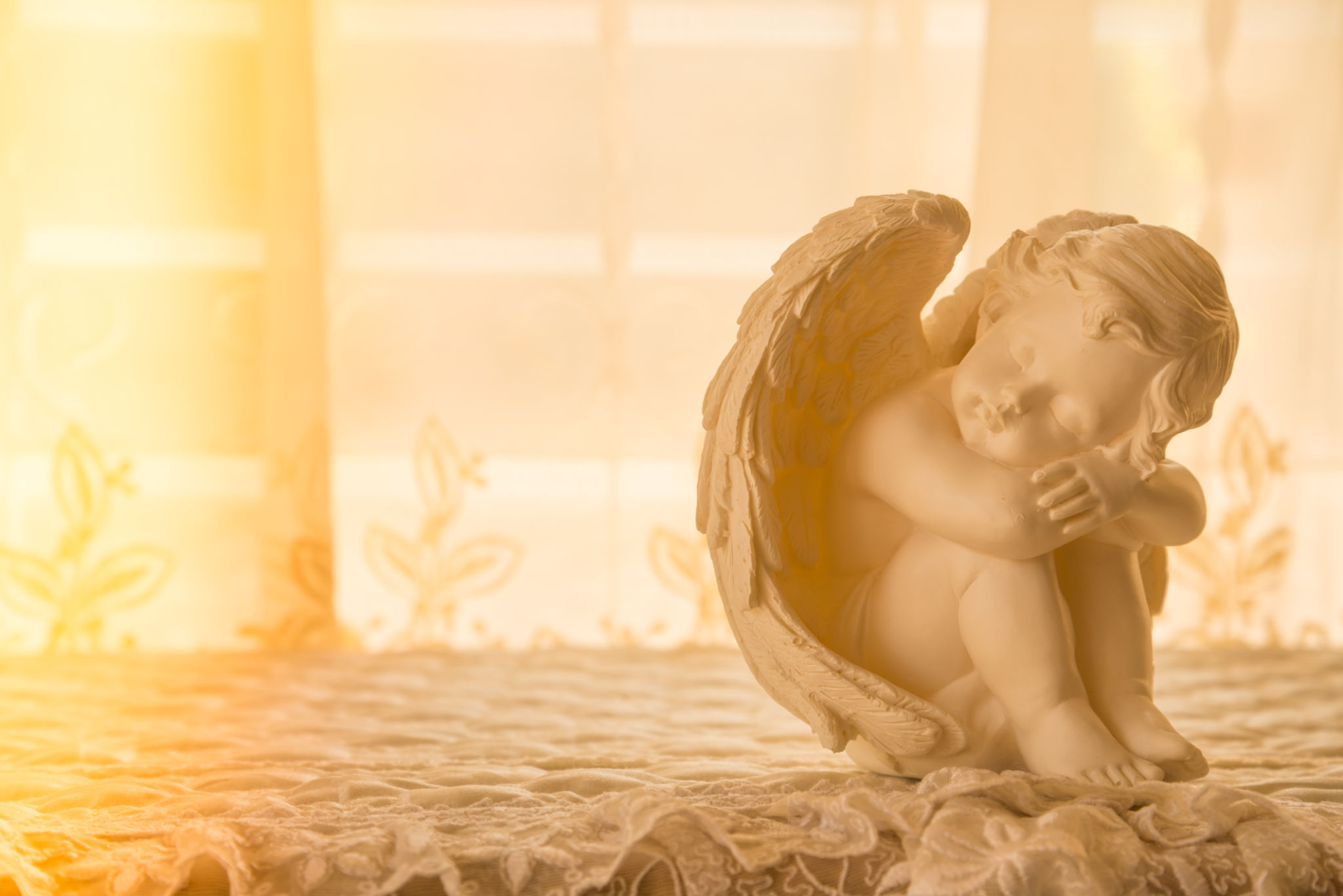 Cute cupid statue with beautiful light leak. Cute cupid statue with beautiful light leak.