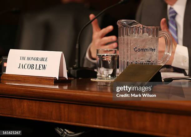Treasury Secretary nominee Jack Lew gestures while speaking during his confirmation hearing before the Senate Finance Committee, February 13, 2013 in...