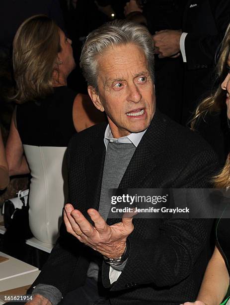 Actor Michael Douglas front row during the Michael Kors Fall 2013 Mercedes-Benz Fashion Show at The Theater at Lincoln Center on February 13, 2013 in...