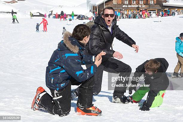 Prince Joachim of Denmark plays with his two son's Prince Nikolai and Prince Felix during an annual family skiing holiday on February 13, 2013 in...