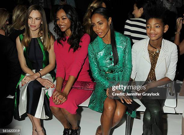 Actress Hilary Swank, Actress Zoe Saldana, Actress Jada Pinkett Smith and daughter Willow Smith front row during the Michael Kors Fall 2013...