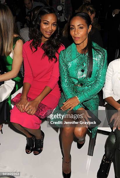 Actress Zoe Saldana and Actress Jada Pinkett Smith front row during the Michael Kors Fall 2013 Mercedes-Benz Fashion Show at The Theater at Lincoln...