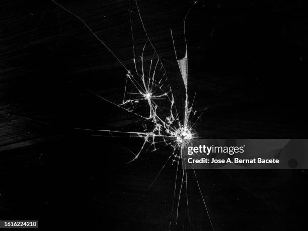 broken glass of a mobile phone screen. - cracked iphone stock pictures, royalty-free photos & images