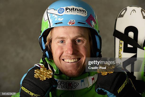 Ted Ligety of the United States of America celebrates with his gold medals for winning the Men's Super Combined and the Men's Super G events during...