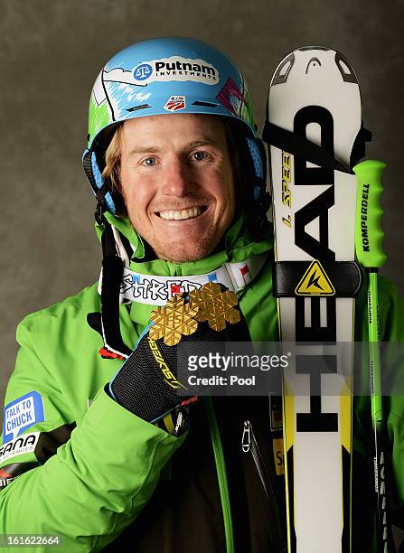 Ted Ligety of the United States of America celebrates with his gold medals for winning the Men's Super Combined and the Men's Super G events during...