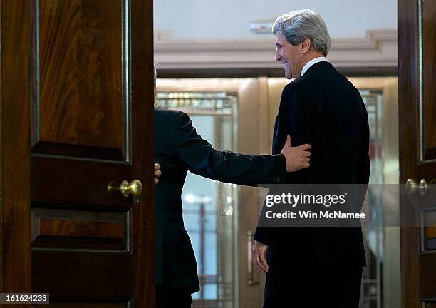 Secretary of State John Kerry and Jordanian Foreign Minister Nasser Judeh depart a joint press conference at the State Department February 13, 2013...