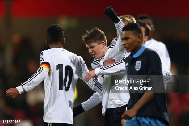Max Besuschkow of Germany celebrates his team's second goal with team mates during the U16 international friendly match between Germany and England...