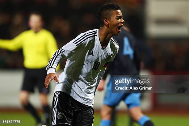 Benjamin Henrichs of Germany celebrates his team's fourth goal during the U16 international friendly match between Germany and England at Suedstadion...