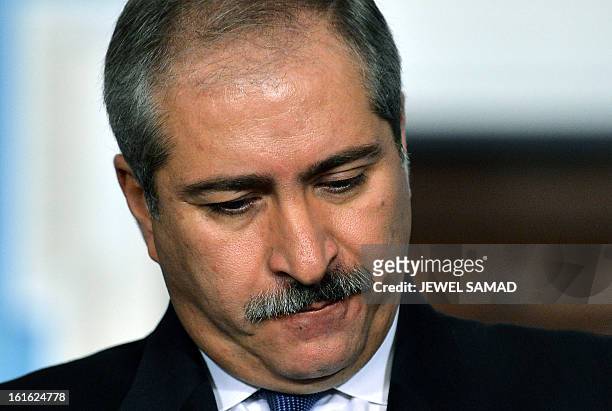 Jordanian Foreign Minister Nasser Judeh answers a question during a joint press briefing with US Secretary of State John Kerry following their...