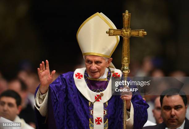 Pope Benedict XVI waves as he leaves after the mass for Ash Wednesday, opening Lent, the forty-day period of abstinence and deprivation for the...