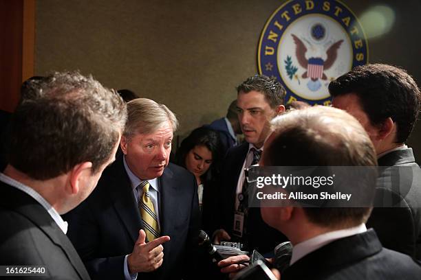 Sen. Linsey Graham speaks to reporters after a press conference about gun control regulation on Capitol Hill in Washington D.C., February 13, 2013....