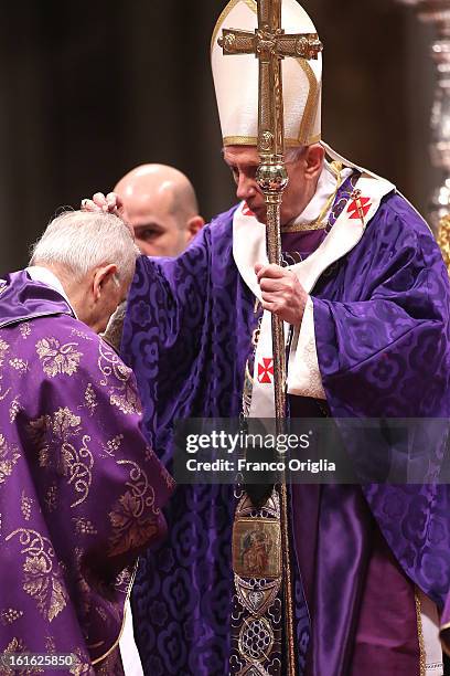 Pope Benedict XVI leads the Ash Wednesday service at the St. Peter's Basilica on February 13, 2013 in Vatican City, Vatican. Ash Wednesday opens the...