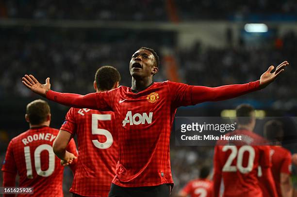 Danny Welbeck of Manchester United celebrates scoring the opening goal during the UEFA Champions League Round of 16 first leg match between Real...