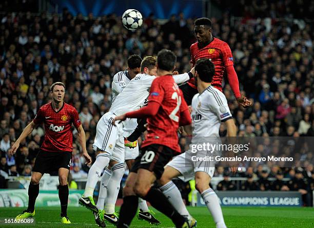 Danny Welbeck of Manchester United heads in the first goal during the UEFA Champions League Round of 16 first leg match between Real Madrid and...