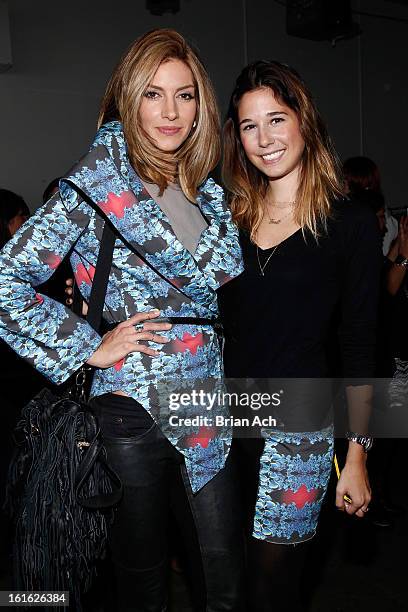 Actress Dawn Olivieri and designer Tess Johnson pose backstage at Nolcha Fashion Week New York 2013 presented by RUSK at Pier 59 Studios on February...