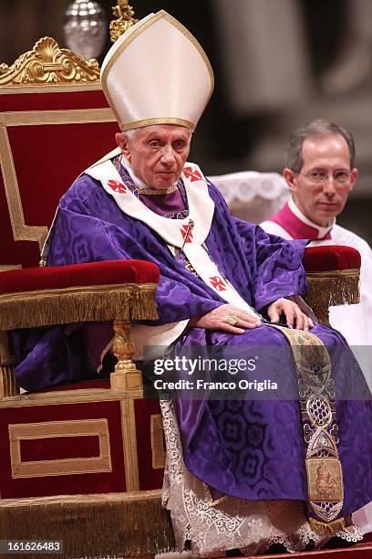 Pope Benedict XVI leads the Ash Wednesday service at the St. Peter's Basilica on February 13, 2013 in Vatican City, Vatican. Ash Wednesday opens the...