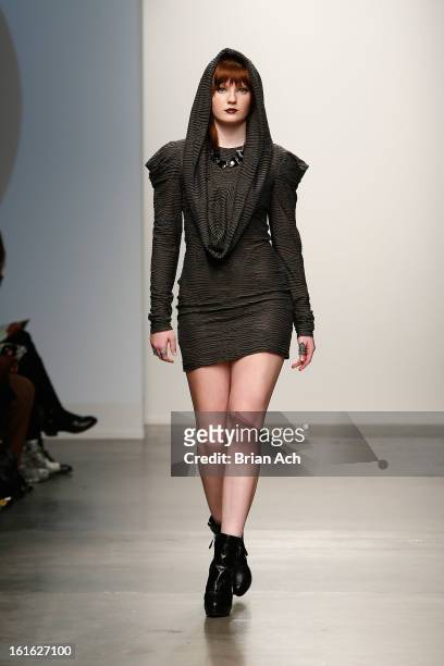 Model walks the runway at the Mikailee Alton show during Nolcha Fashion Week New York 2013 presented by RUSK at Pier 59 Studios on February 13, 2013...