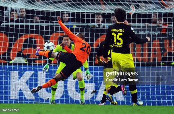 Douglas Costa of Donetsk scores his teams second goal during the UEFA Champions League Round of 16 first leg match between Shakhtar Donetsk and...