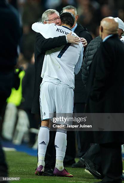 Cristiano Ronaldo of Real Madrid embraces Sir Alex Ferguson, manager of Manchester United, at the end of the UEFA Champions League Round of 16 first...