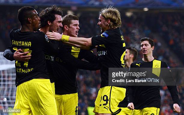 Mats Hummels of Dortmund celebrates after scoring his teams second goal during the UEFA Champions League Round of 16 first leg match between Shakhtar...