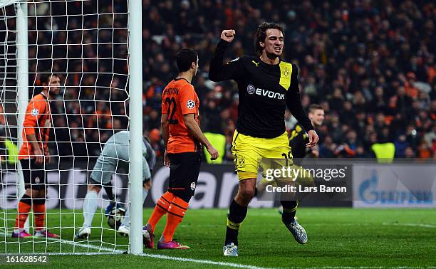 Mats Hummels of Dortmund celebrates after scoring his teams second goal during the UEFA Champions League Round of 16 first leg match between Shakhtar...