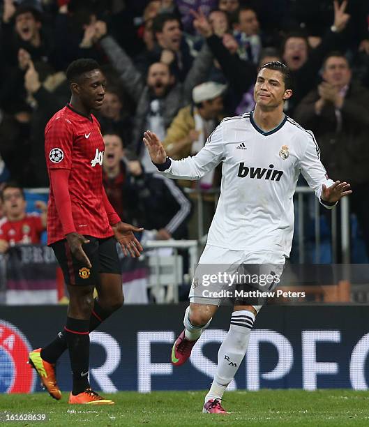 Cristiano Ronaldo of Real Madrid celebrates scoring their first goal during the UEFA Champions League Round of 16 first leg match between Real Madrid...